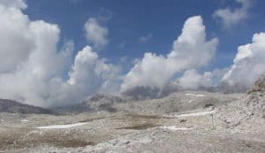 clouds climbing from the woods san martino plateau